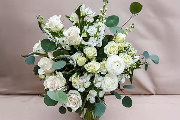 Poise arrangement highlighting structured blooms in a modern, poised presentation